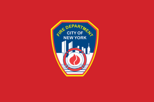 The New York City Fire Department shield on a red background.